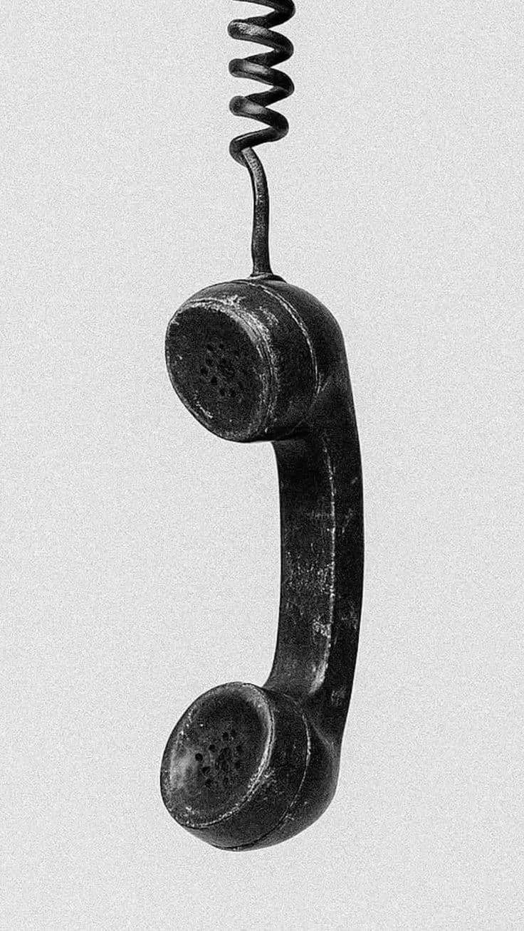 A hotel phone receiver, off the hook